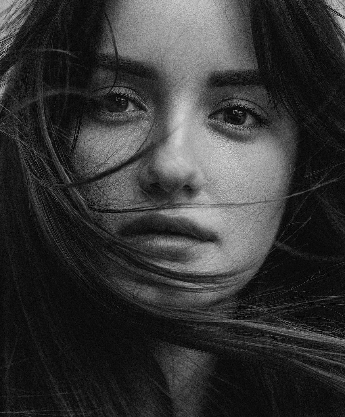 Black and white portrait of a woman.