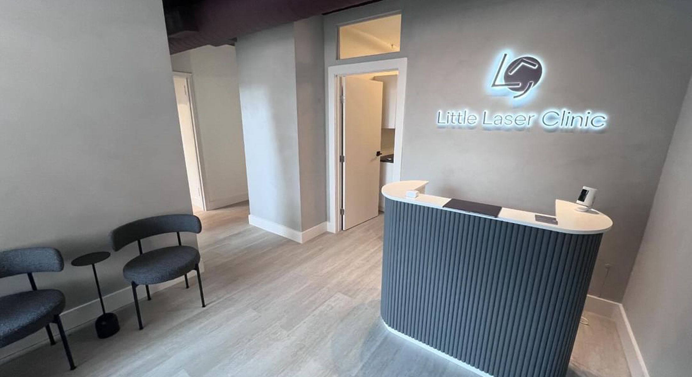 Modern reception area of Little Laser Clinic.
