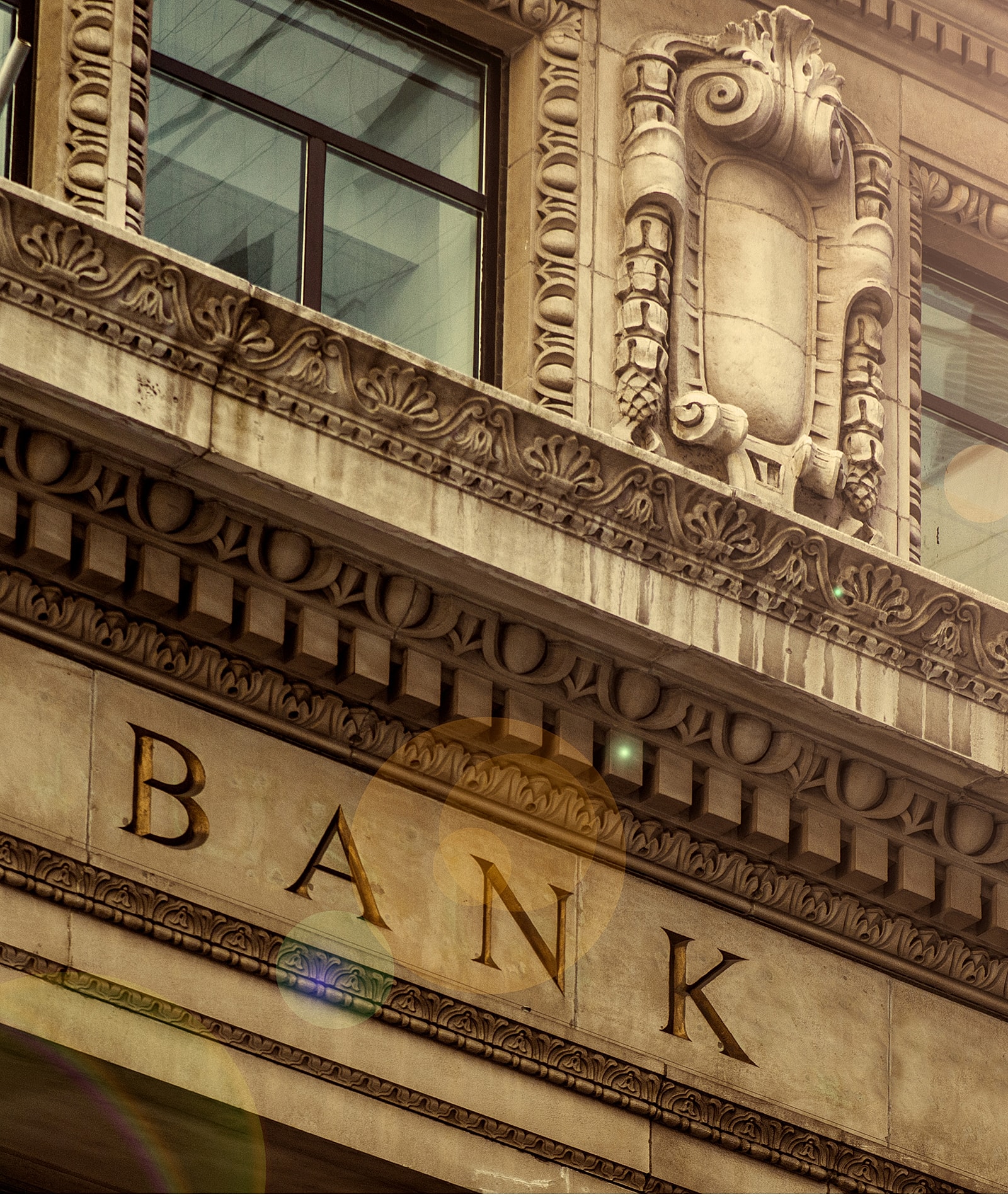 Ornate bank building facade with decorative details.