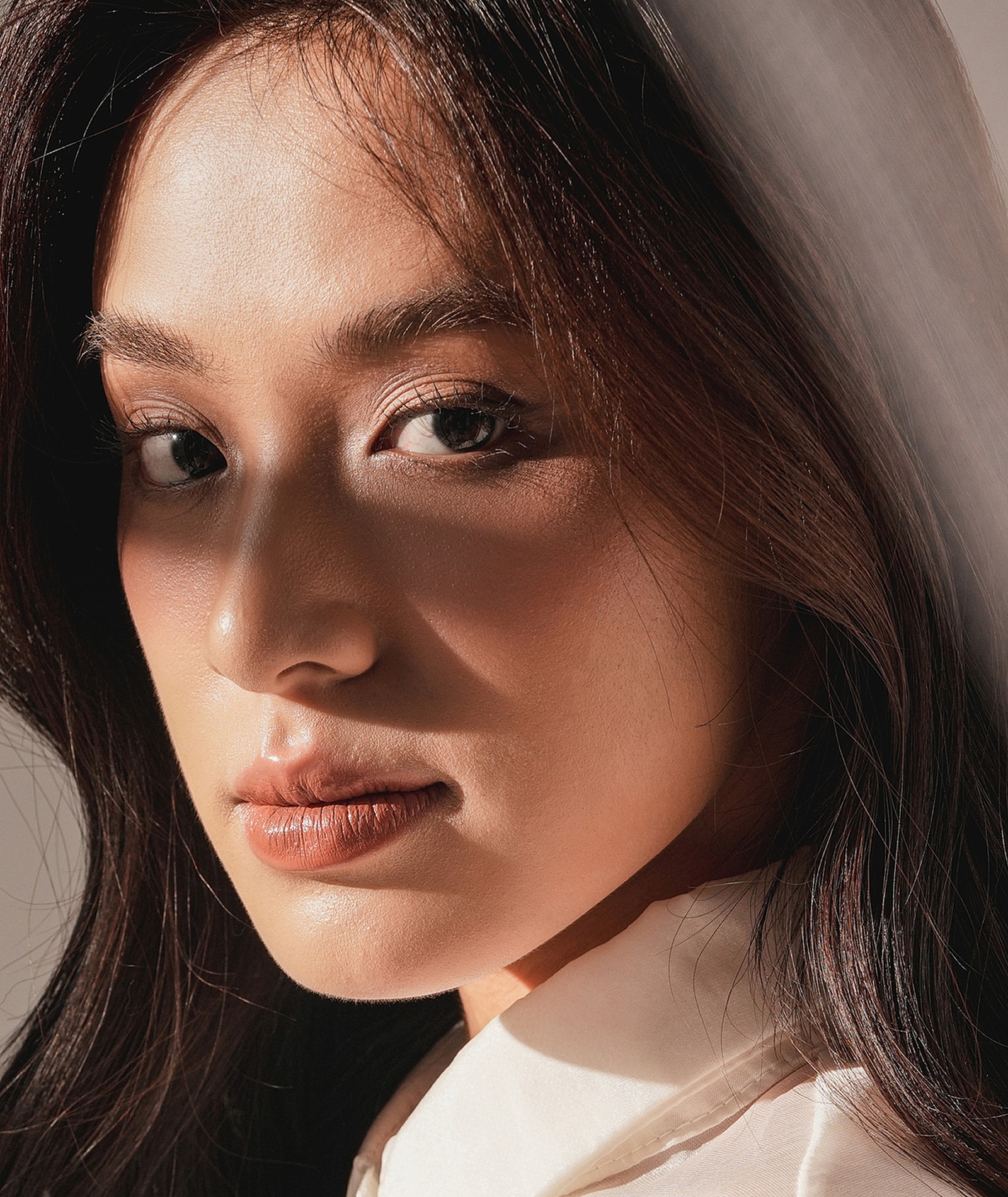 Close-up portrait of a woman with natural beauty.